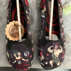 Hot chocolate freak show slip ons